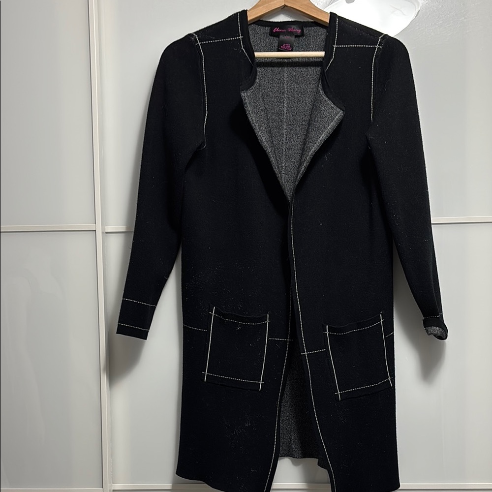 Black Trench Coat with Lapels and Textured Fabric